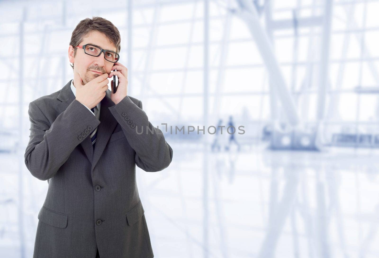 young business man on the phone, at the office