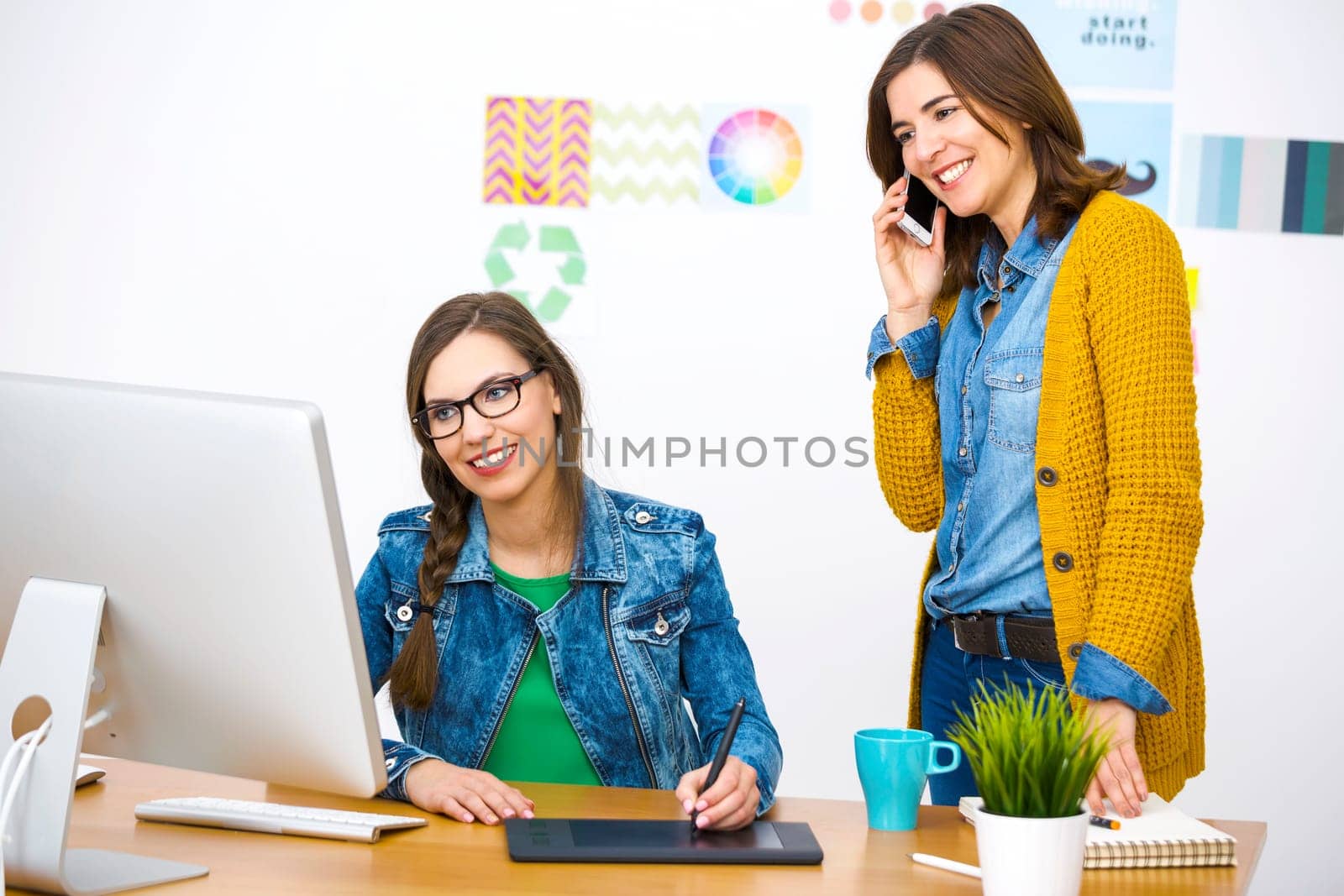 Women working at desk In a creative office, team work
