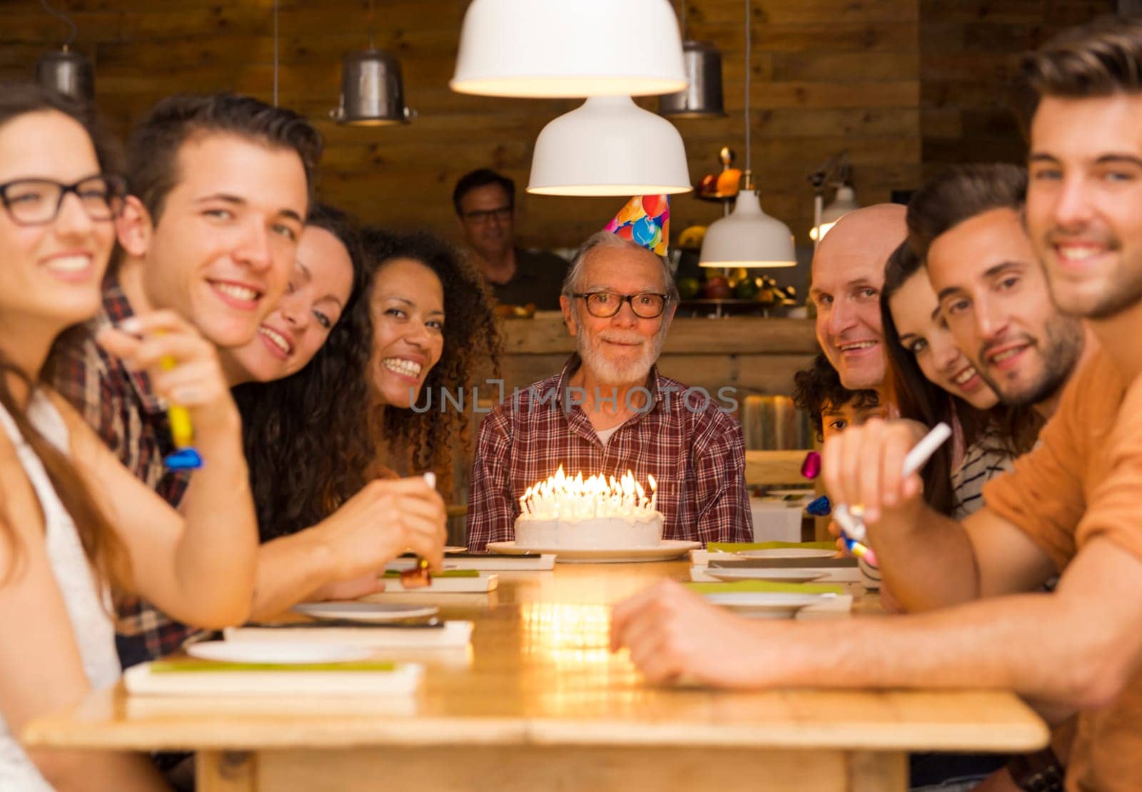 Big family celebrate the birthday of the grandfather