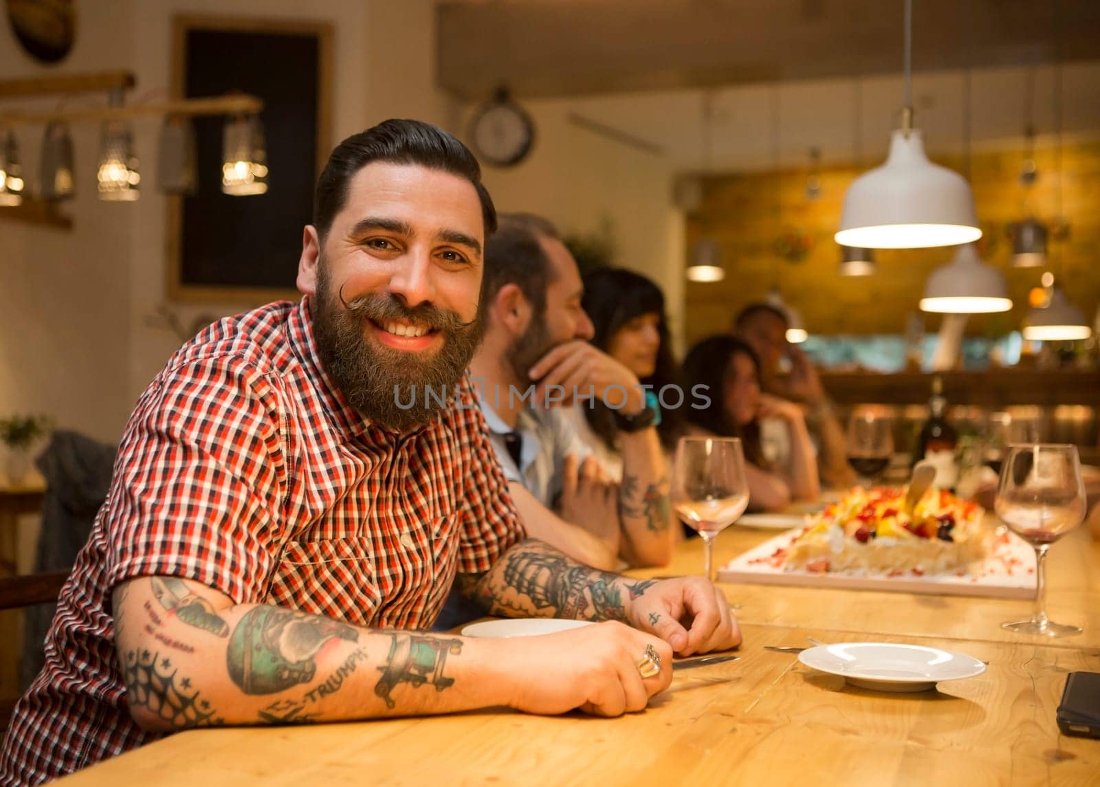 Multi-ethnic group of friends dinner at the restaurant