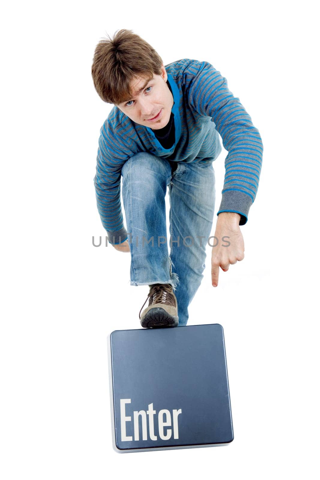 young casual man with the enter key