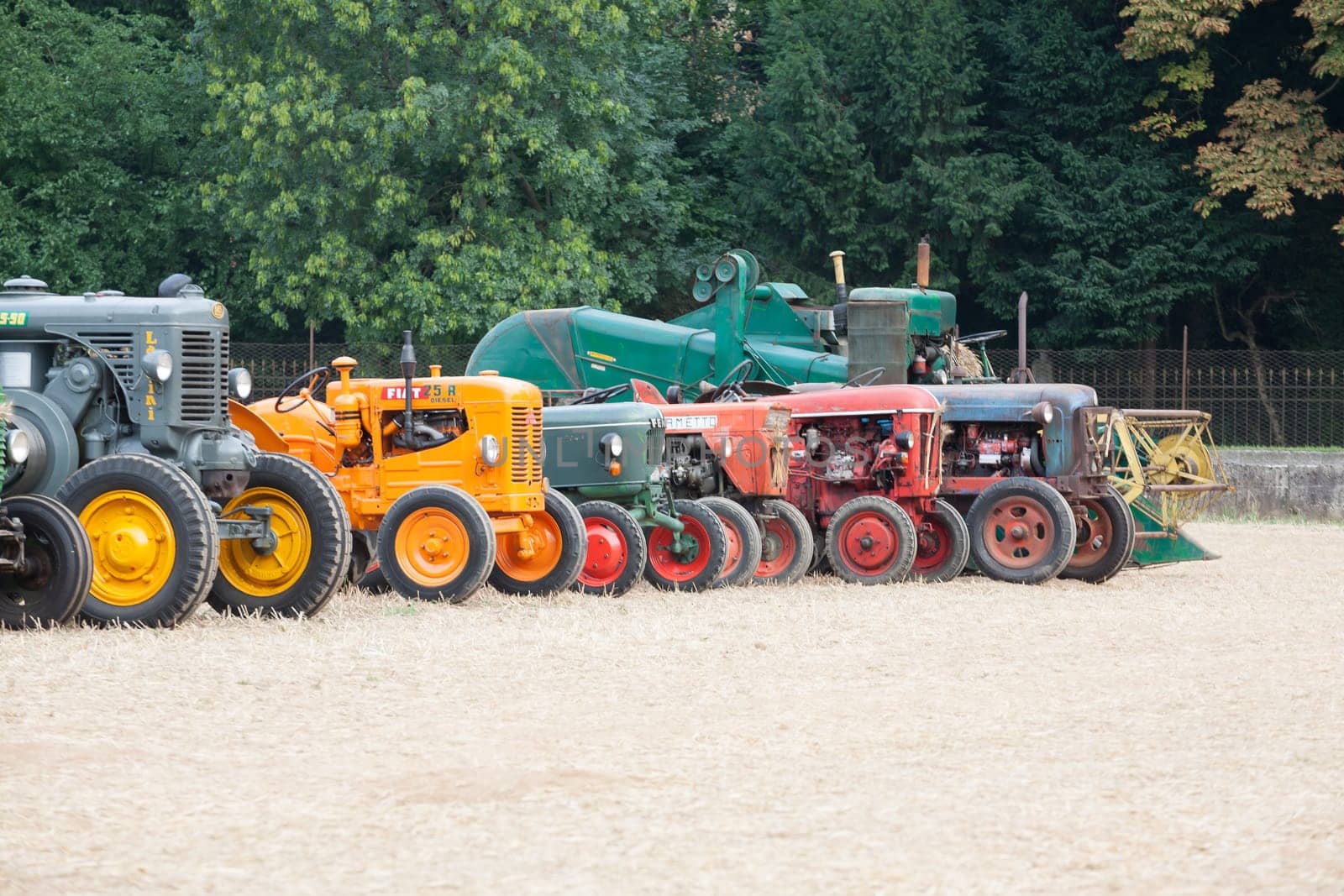 Detail of old tractors in perspective, agricultural vehicle, rural life