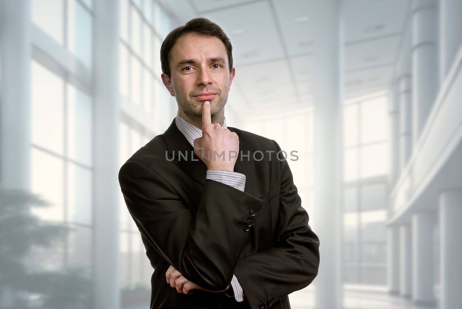 young business man portrait at the office