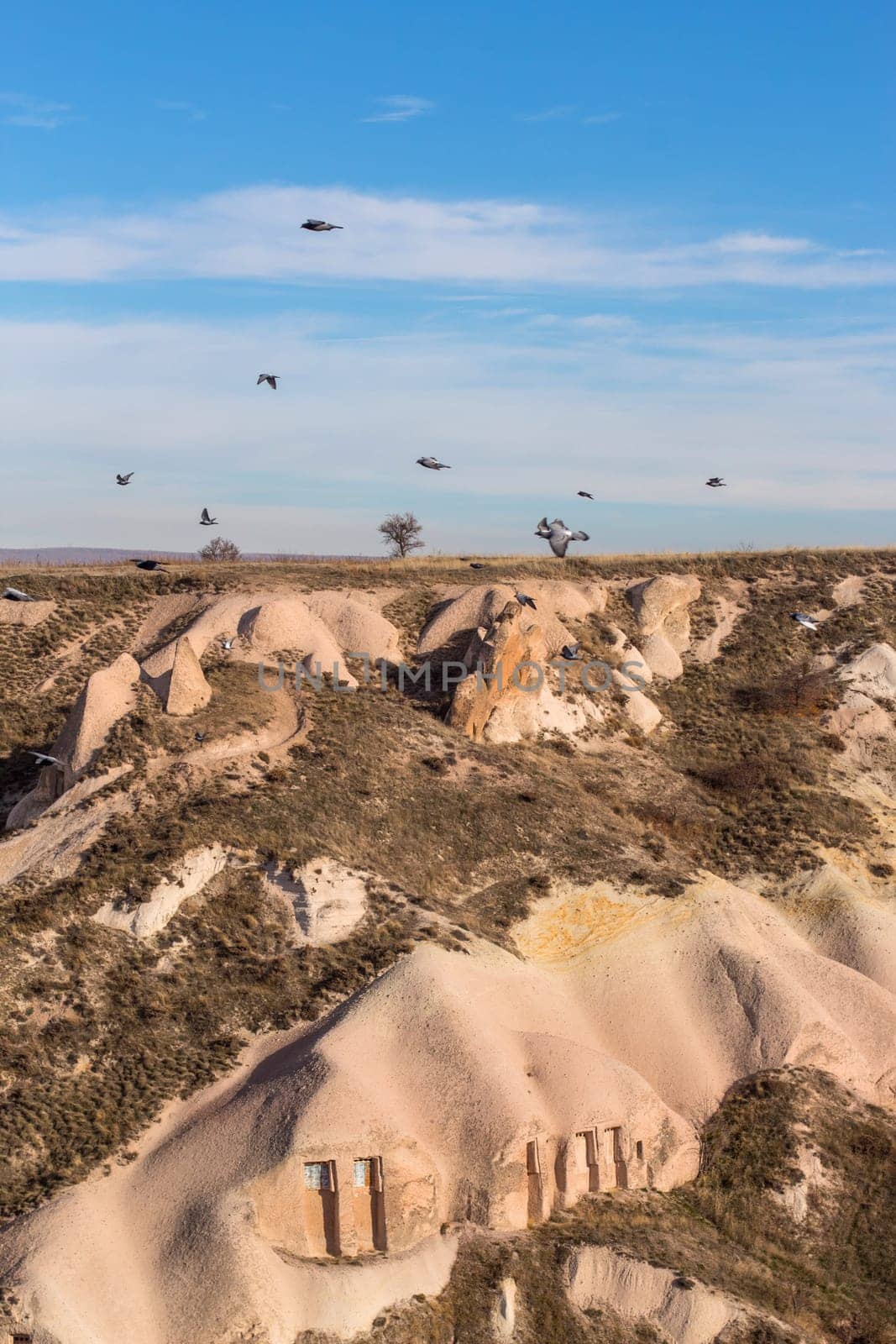 Volcanic cliffs and rock formations at Cappadocia, Anatolia. Turkey