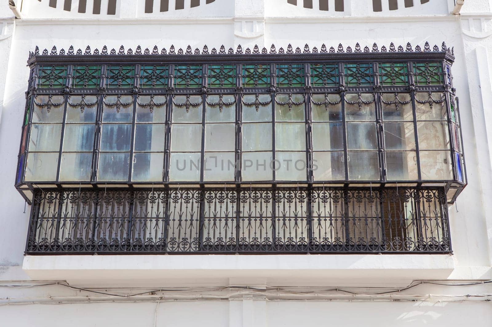 19th Century stained-glass balcony. Alcantara streets old town, Caceres, Extremadura, Spain