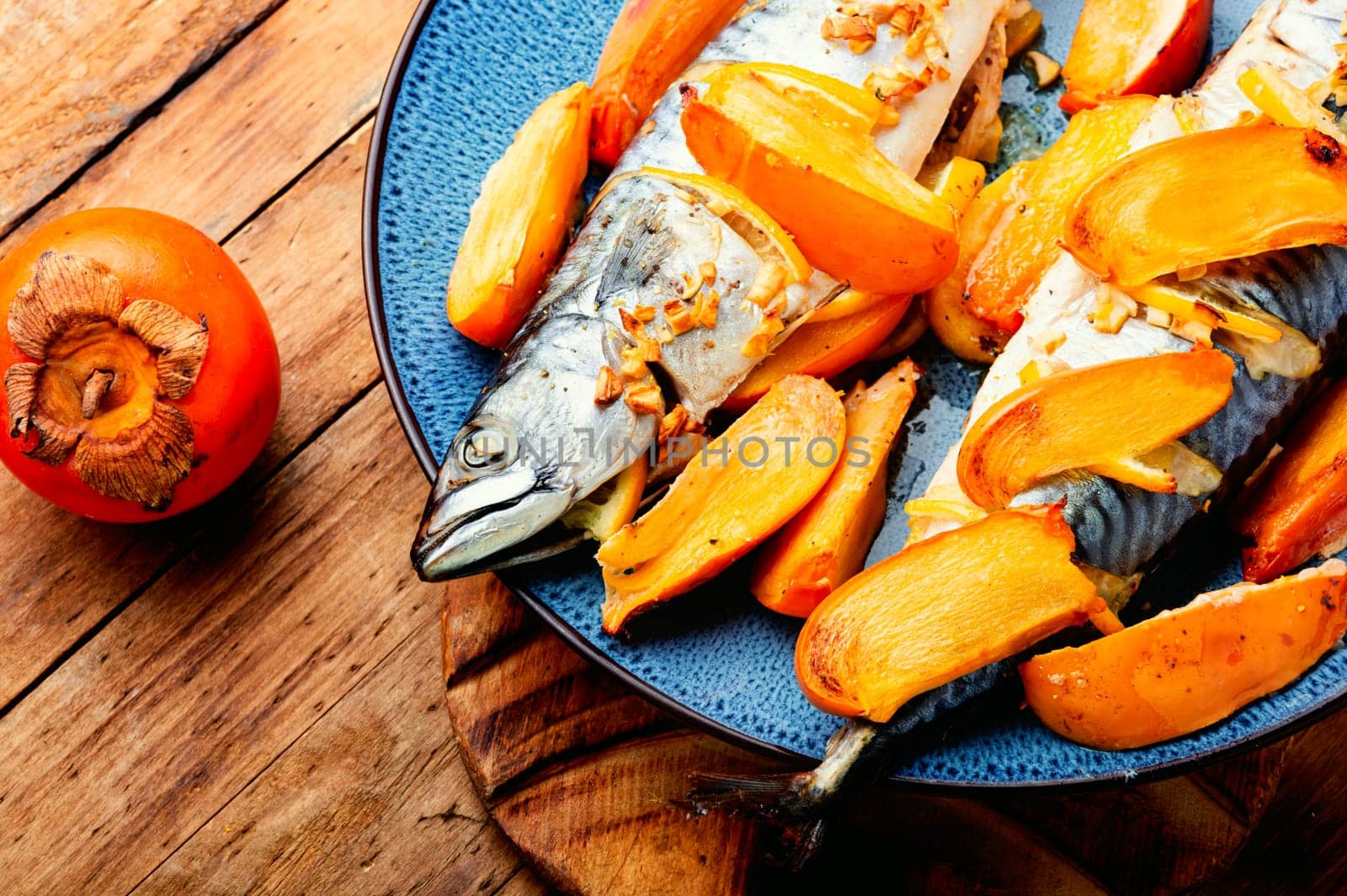 Appetizing mackerel fish grilled in persimmon fruit sauce. Food recipe