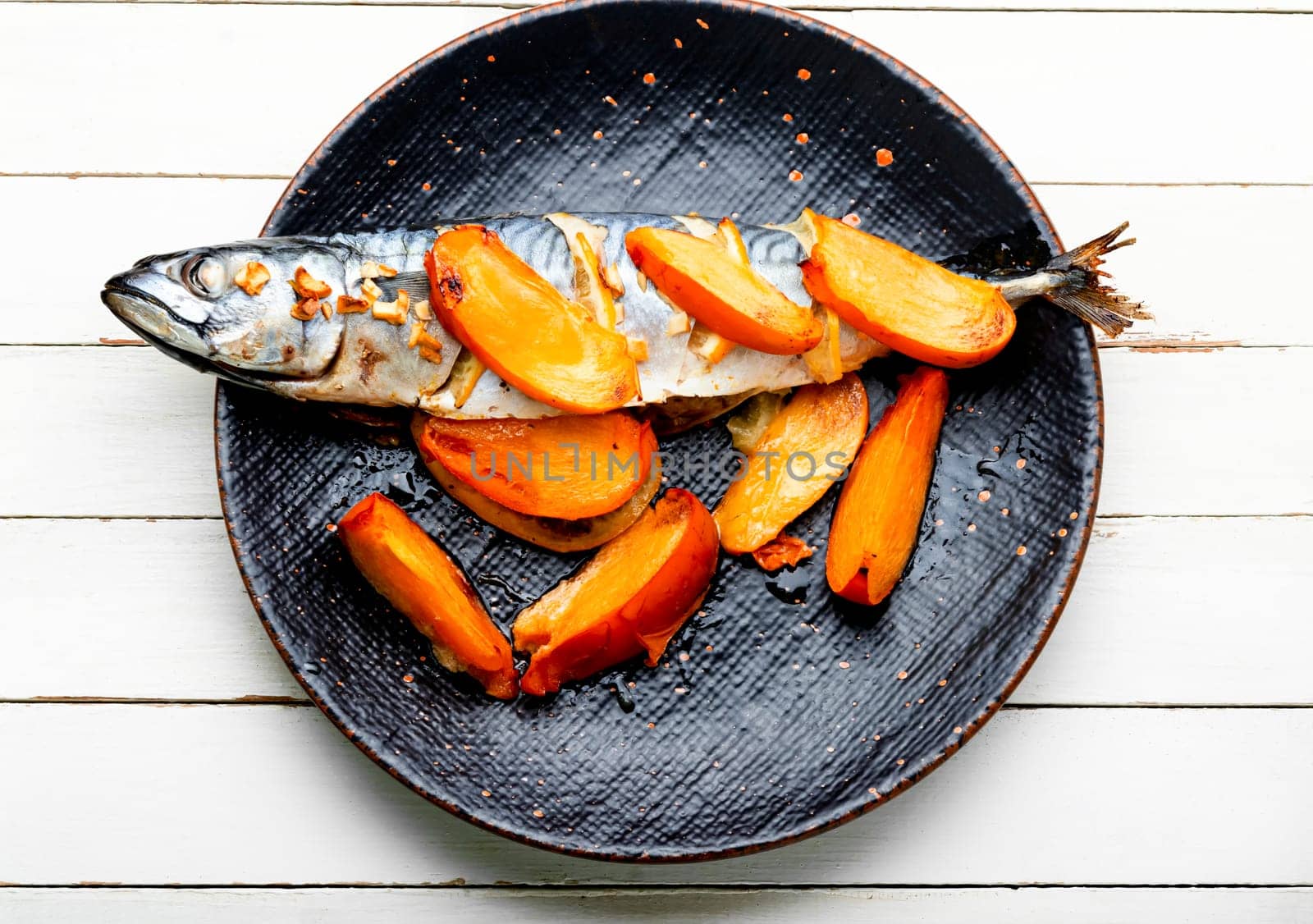 Appetizing mackerel fish grilled in persimmon fruit sauce. Food recipe