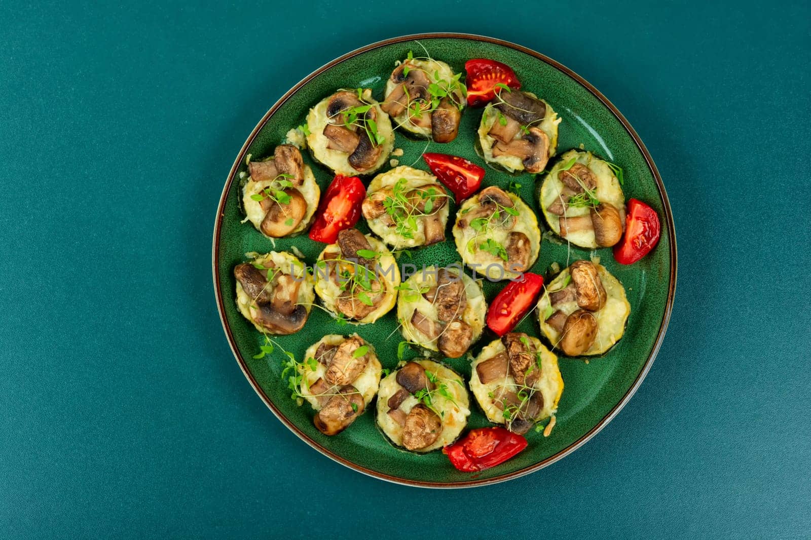 Diet food-baked zucchini with mushrooms. Baked courgette
