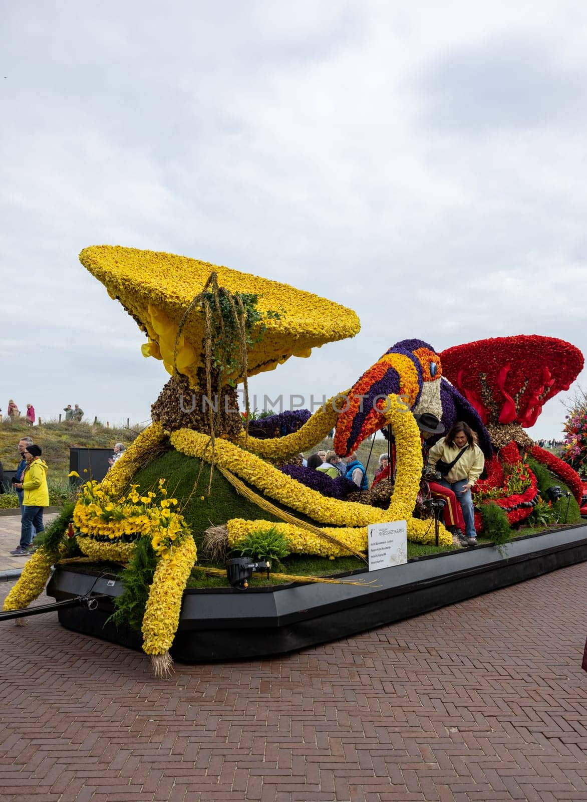 Noordwijk, Netherlands - April 22, 2023: Spectacular flower covered floats in the Bloemencorso Bollenstreek the annual spring flower parade from Noordwijk to Haarlem in the Netherlands.