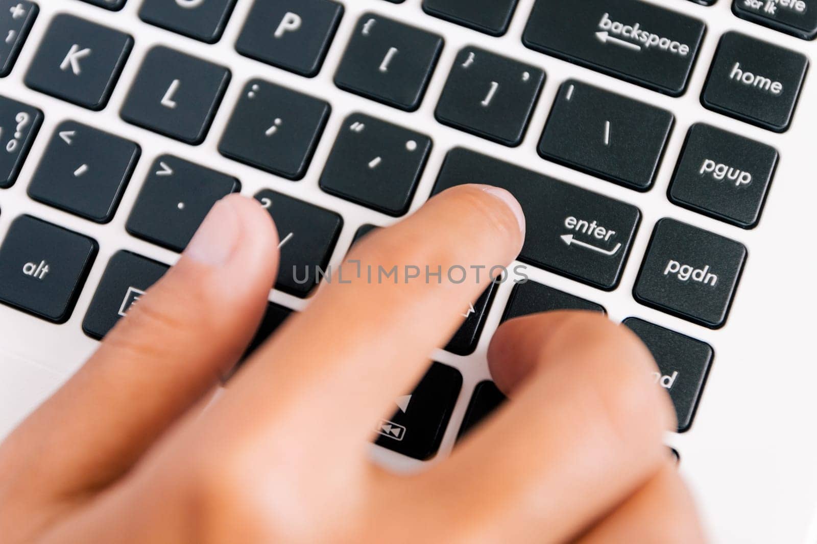 hand press enter button on keyboard computer