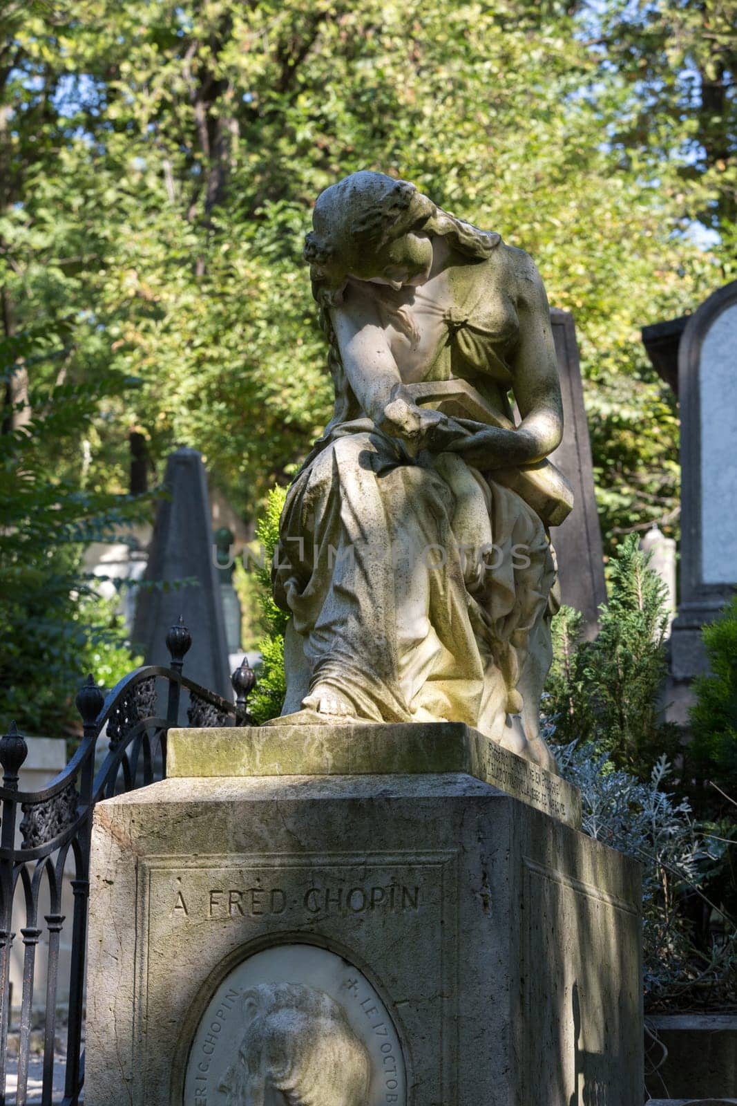 PARIS, FRANCE - SEPT 12, 2014: Tomb of Frederic Chopin, famous Polish composer, at Pere Lachaise cemetery in Paris, France