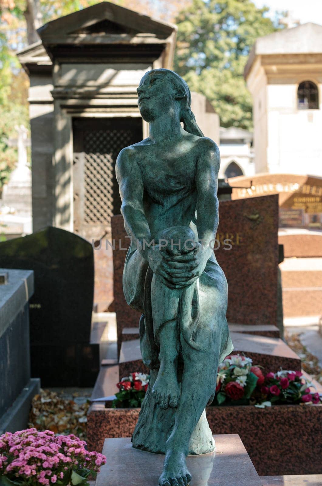 PARIS, FRANCE - SEPT 12, 2014: View of Pere Lachaise. World's most visited cemetery, attracting thousands of visitors to graves of those who have enhanced French life over past 200 years.