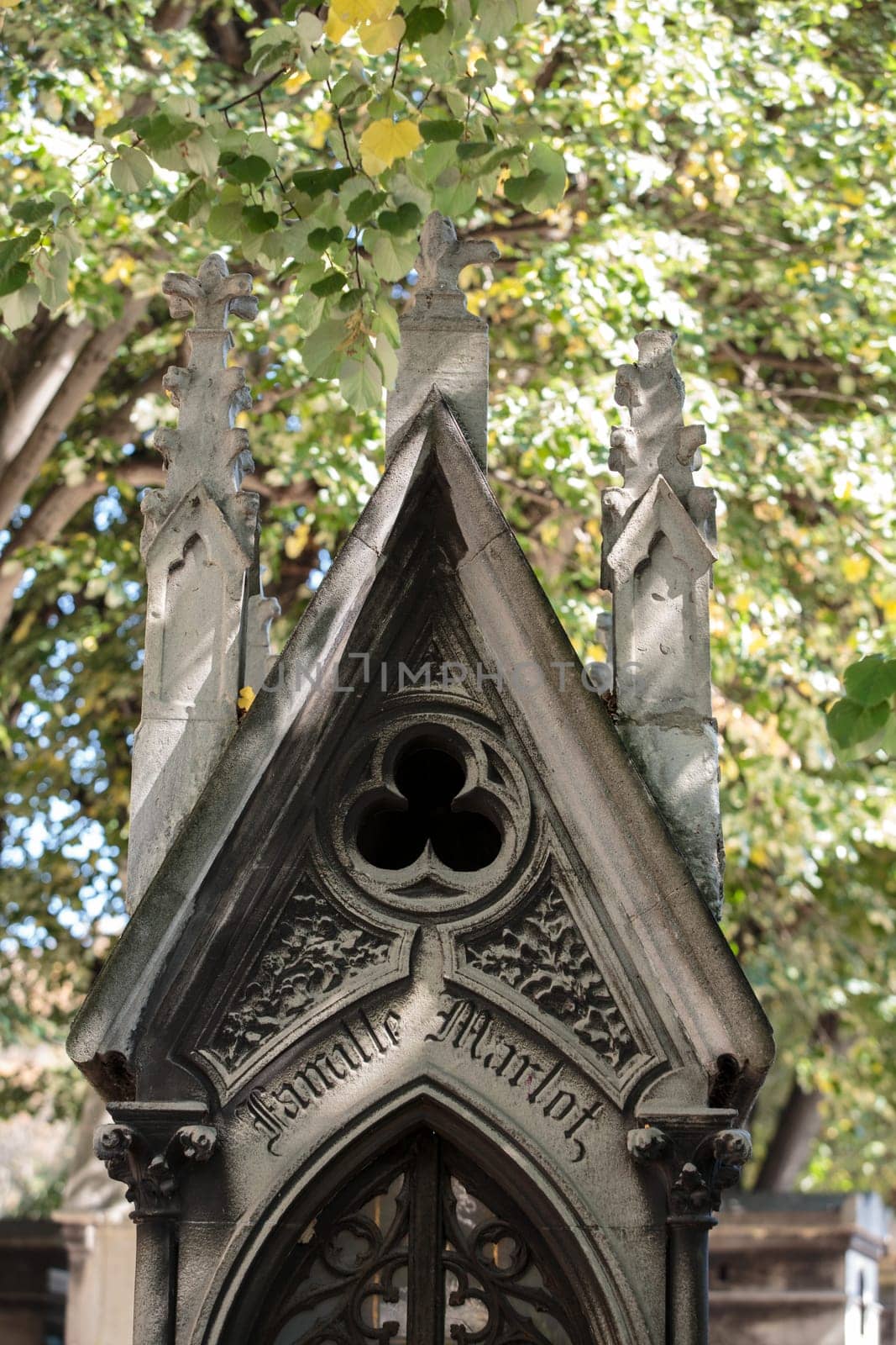 PARIS, FRANCE - SEPT 12, 2014: View of Pere Lachaise. World's most visited cemetery, attracting thousands of visitors to graves of those who have enhanced French life over past 200 years.