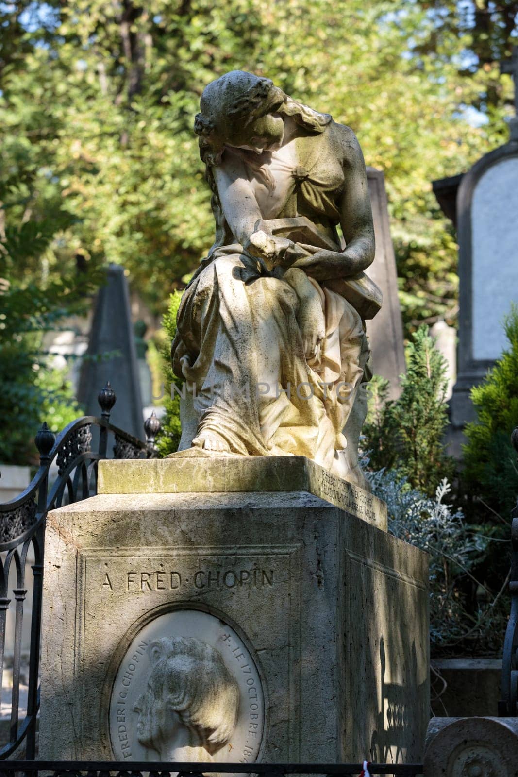 PARIS, FRANCE - SEPT 12, 2014: Tomb of Frederic Chopin, famous Polish composer, at Pere Lachaise cemetery in Paris, France