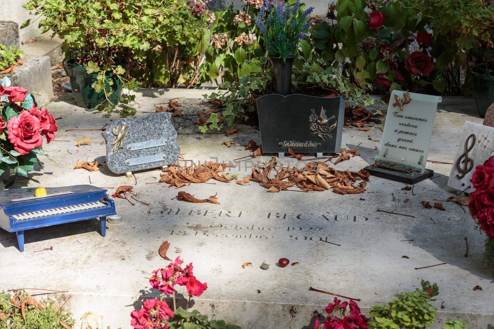PARIS, FRANCE - SEPT 12, 2014: Gilbert Becaud grave in Pere-Lachaise cemetery, Paris, France