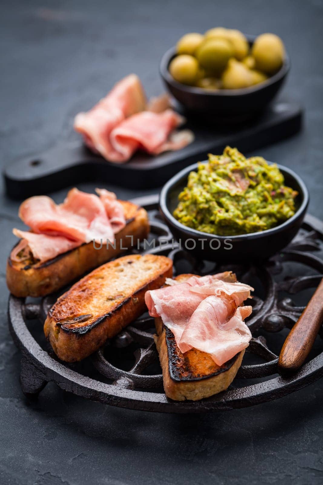 Fried bread, substitute for toast, savory French toast with avocado spread and Serrano ham
