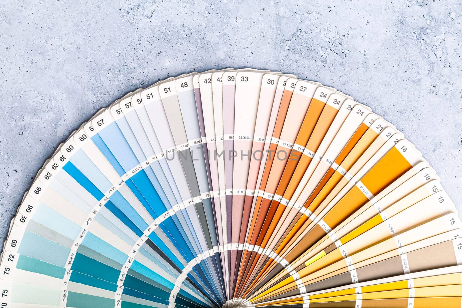 Industrial color palette guide of paint samples catalog on grey background