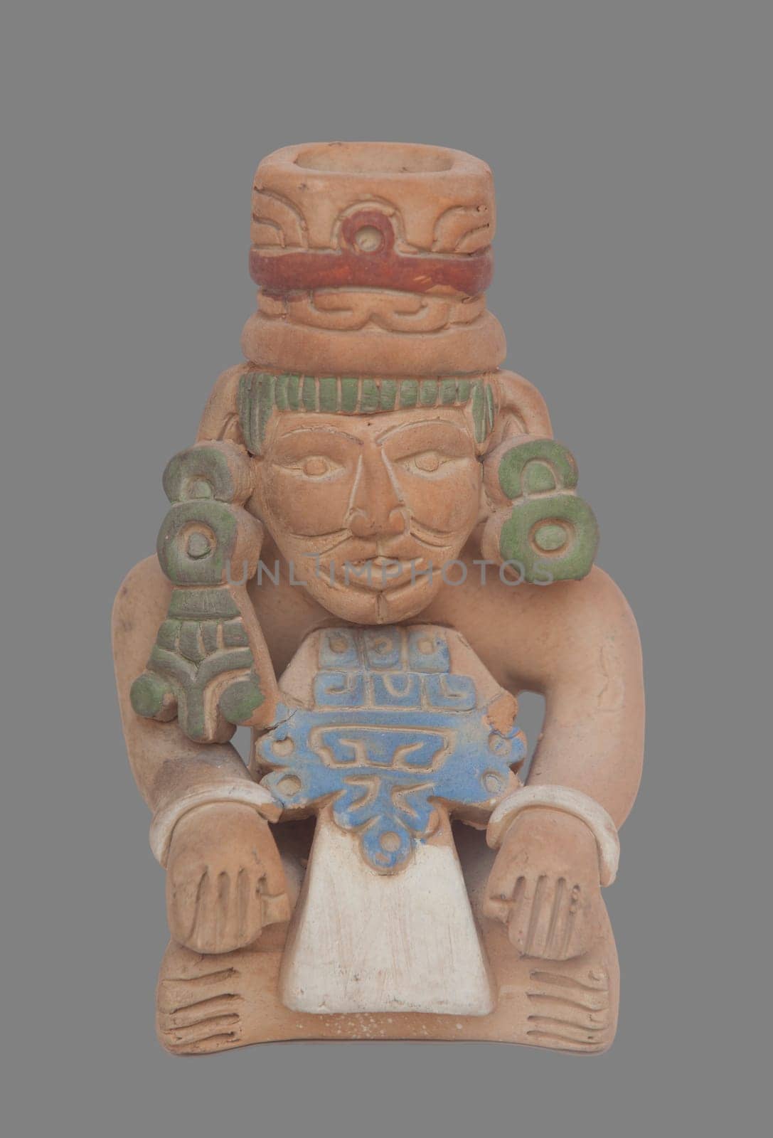 Mayans civilization souvenir, terracotta replicas. Isolated over grey background