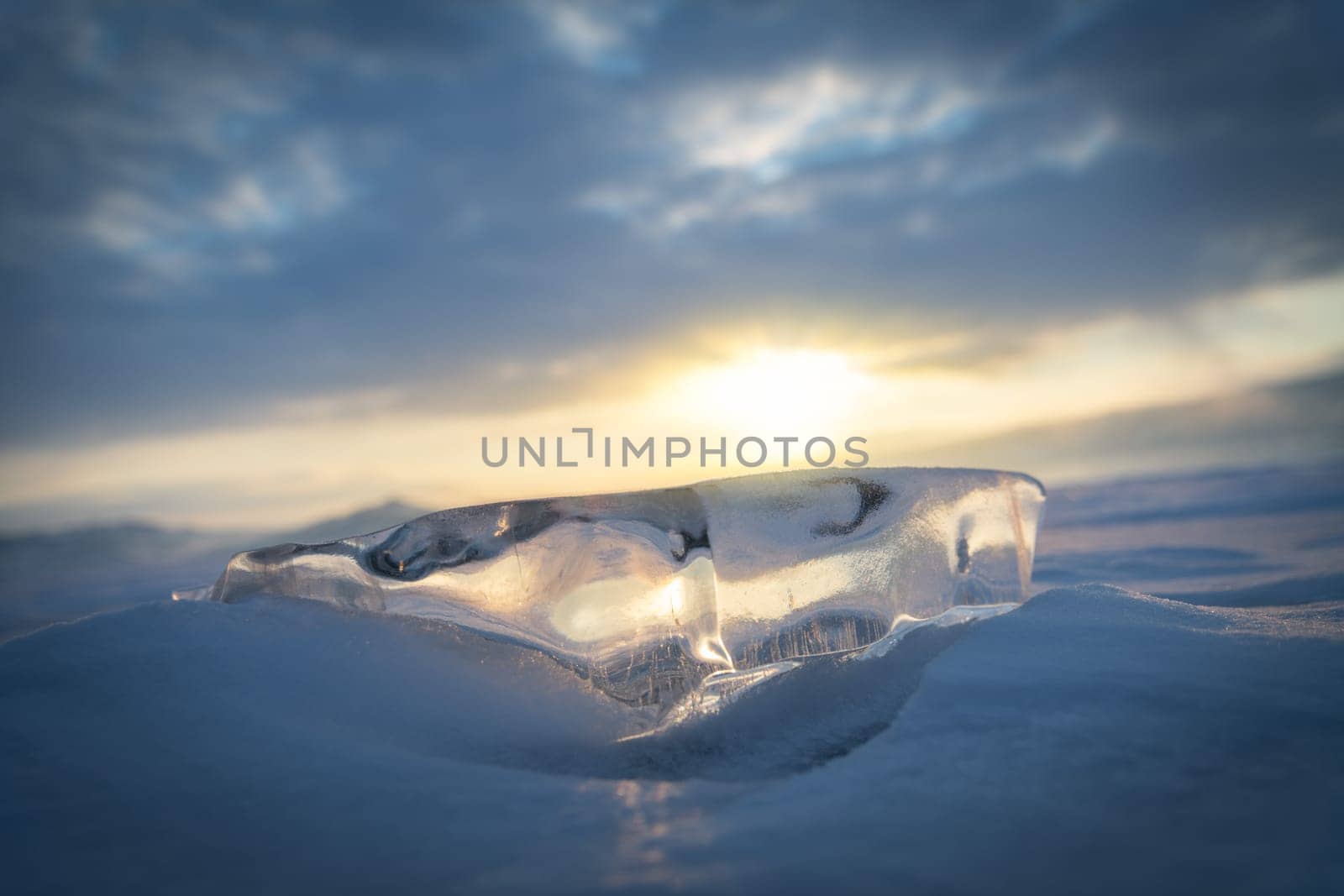Natural breaking ice over frozen water lake, Baikal Russia winter season natural landscape background