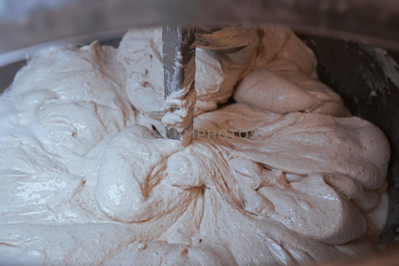 Organic Bakery - details of baker baking bread handmade