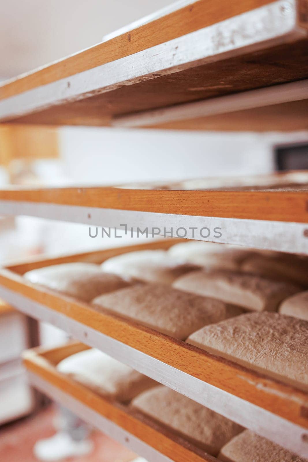 Organic Bakery - details of baker baking bread handmade