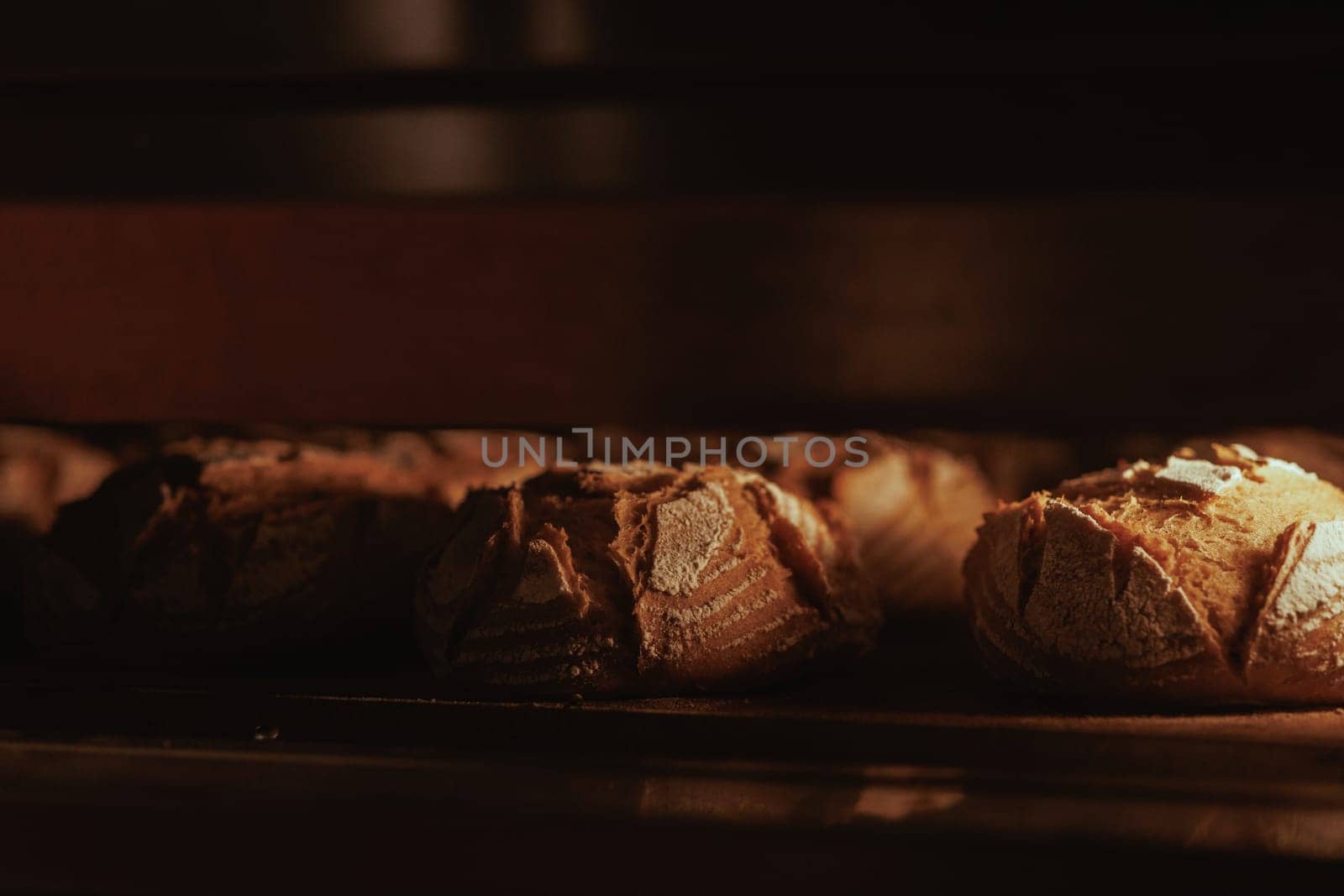 Organic Bakery - details of baker baking bread handmade