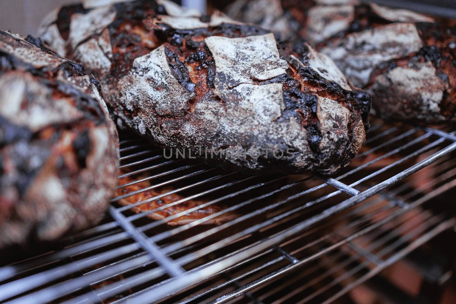 Organic Bakery - details of baker baking bread handmade