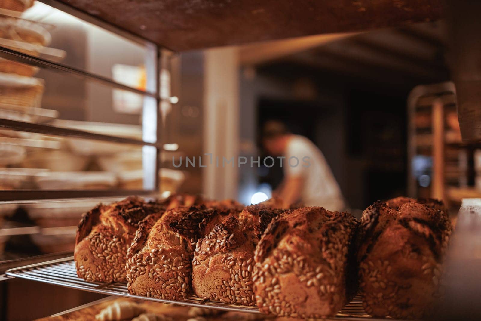 Organic Bakery - details of baker baking bread handmade