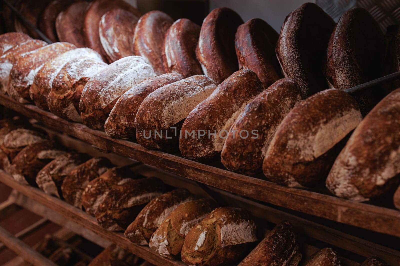 Organic Bakery - details of baker baking bread handmade