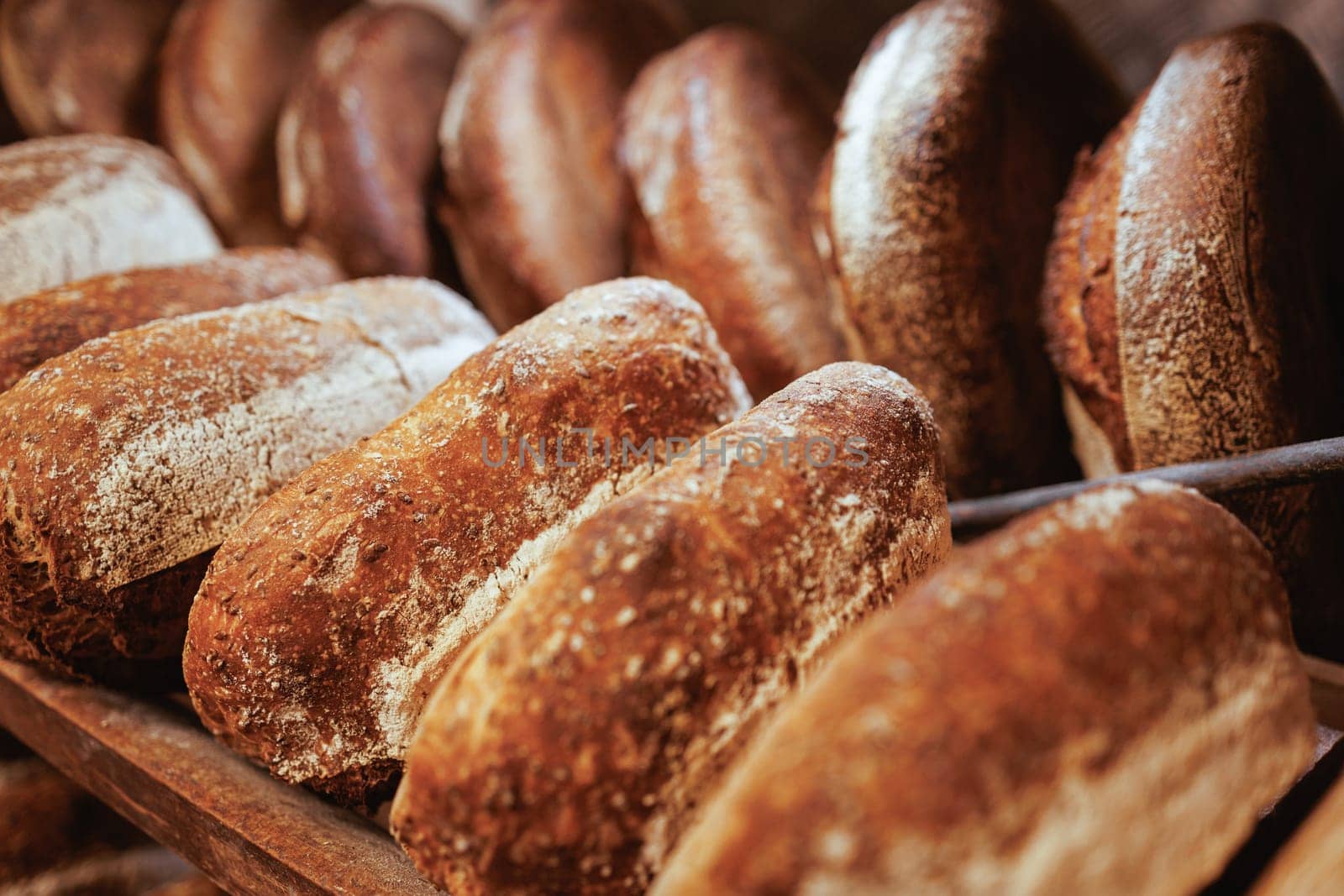 Organic Bakery - details of baker baking bread handmade