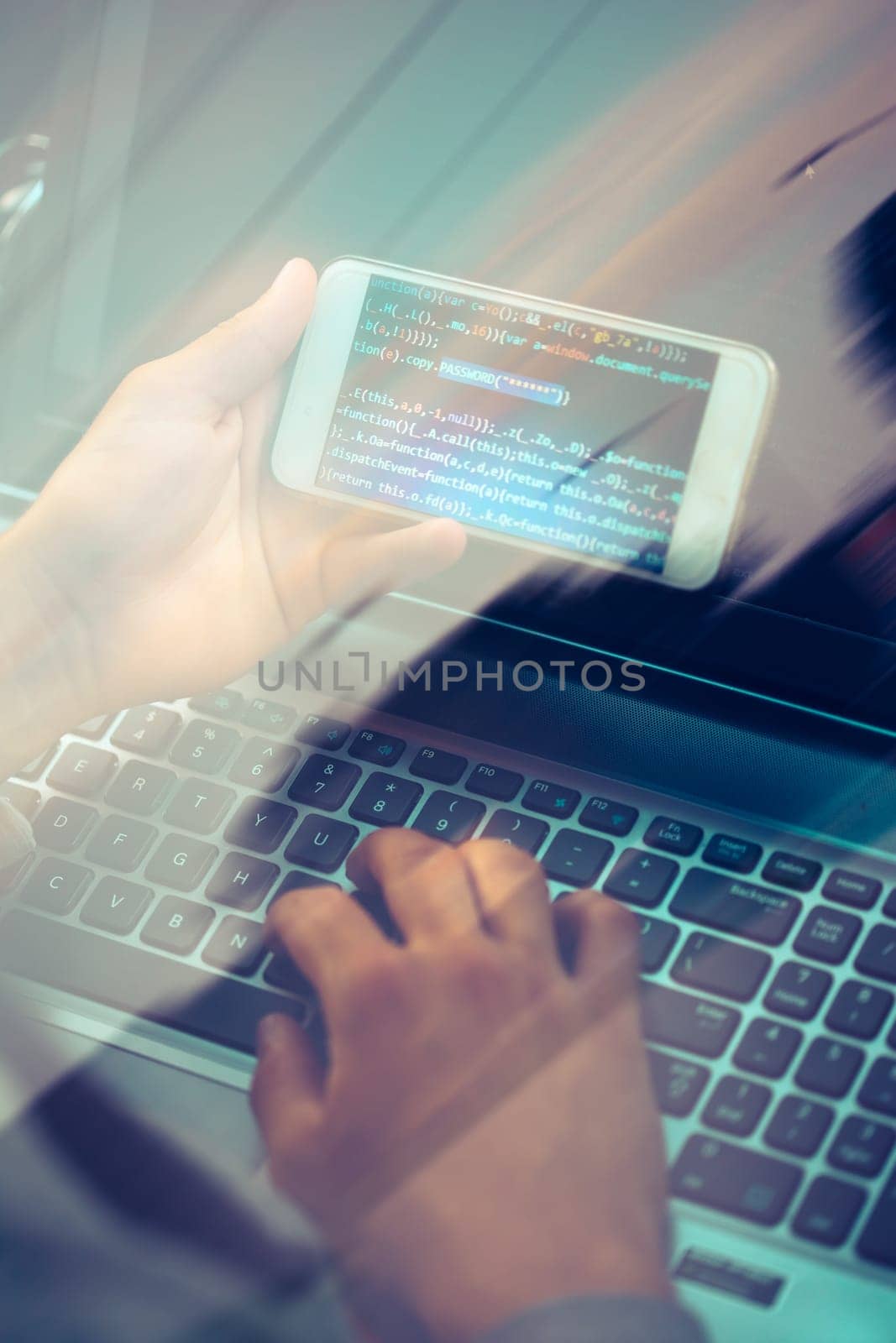 Hacker using computer, smartphone and coding to steal password and private data remotely from car. Screen displaying program code, website development, application building, password and private data