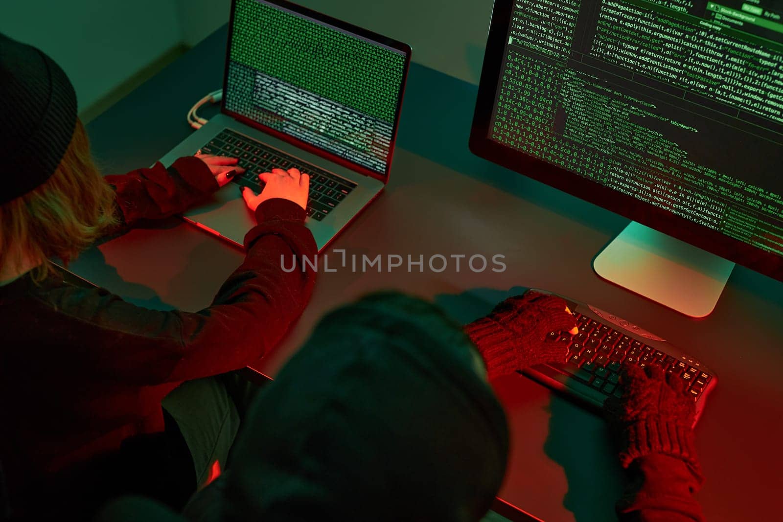 Anonymous people using computer and programming to break code. Cyber security threat. Internet and network security. Access to private information. Anonymous hackers using technology to access to password and encrypted data. Cyber attack