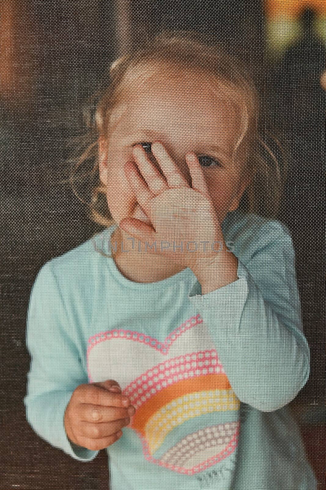 Little adorable girl posing for a portrait. Real people, authentic situations