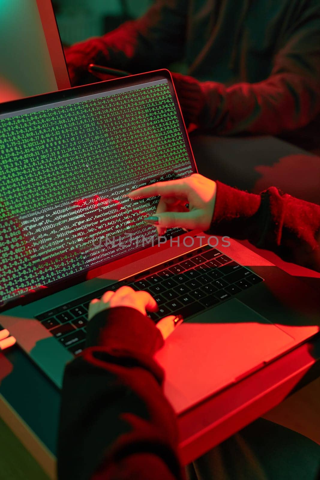 Anonymous people using computer and programming to break code. Cyber security threat. Internet and network security. Access to private information. Anonymous hackers using technology to access to password and encrypted data. Cyber attack