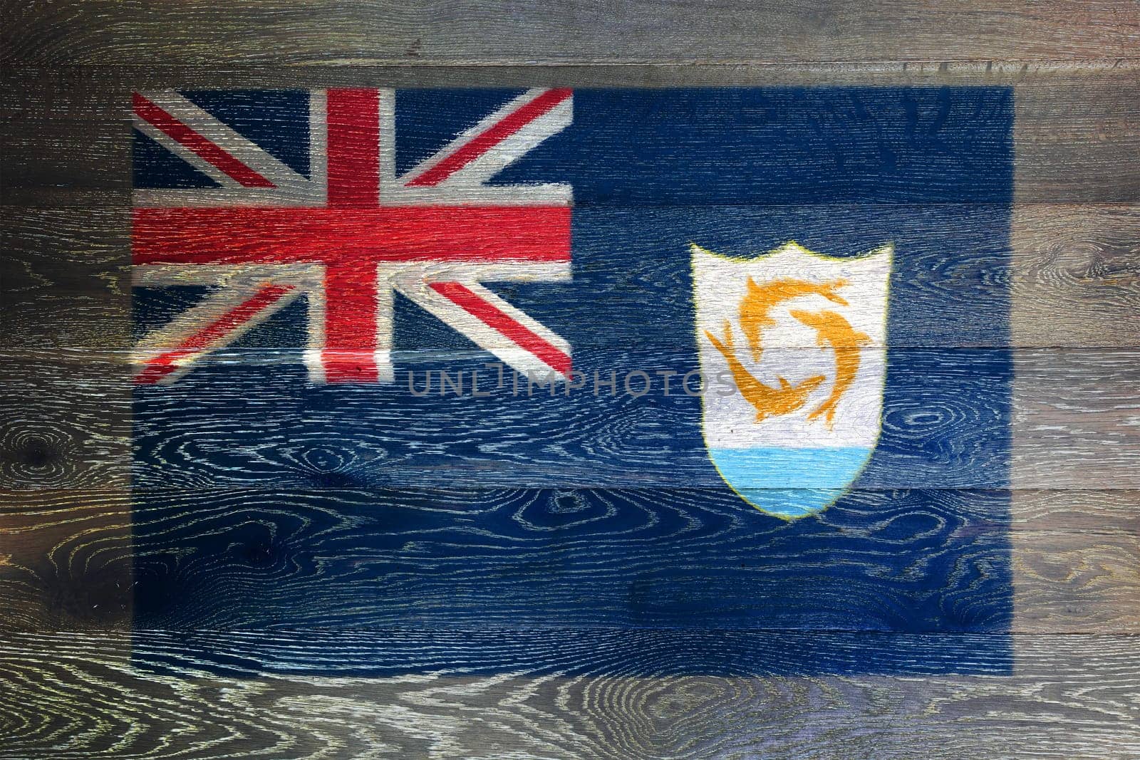 An Anguilla flag on rustic old wood surface background