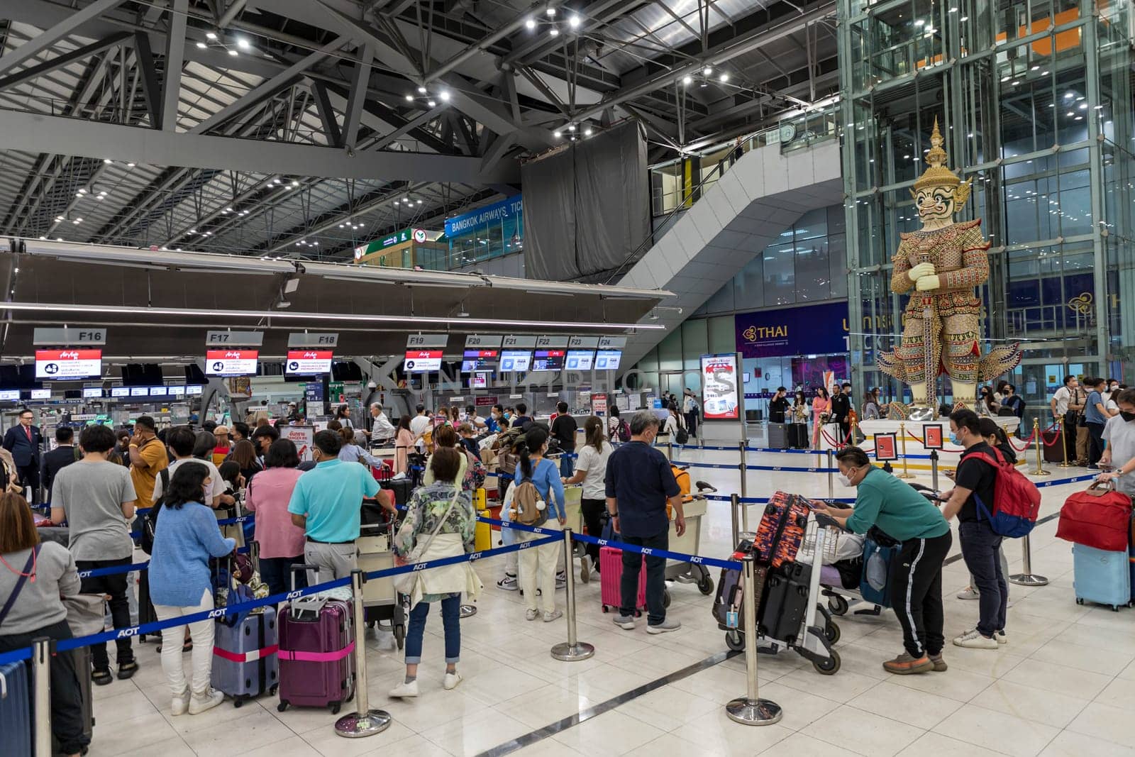 Bangkok, Thailand - April 10, 2023: Suvarnabhumi Airport with many travelers during the Songkran Festival because it is the Thai New Year which is a long holiday.There are many festivals in provinces.