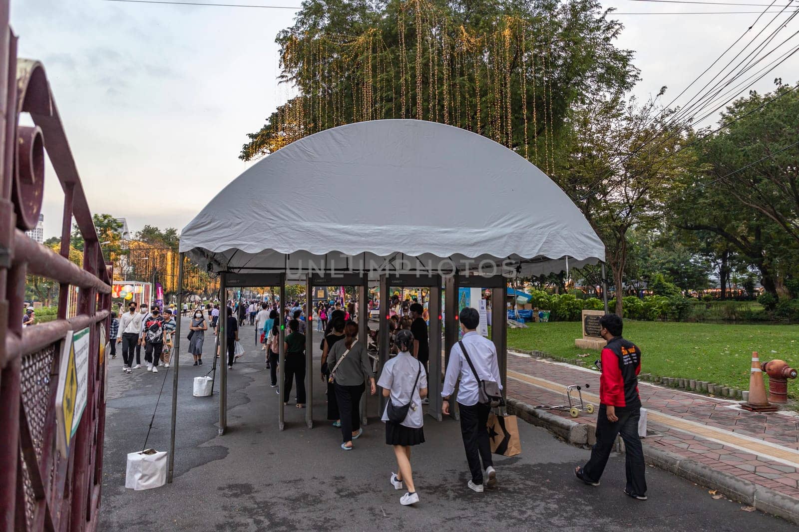 Bangkok, Thailand - Dec 8, 2022 :People have to walk through metal detectors. For safety in organizing the Red Cross Fair Held between December 8-18, 2022 at Lumpini Park after 2 years of suspension.