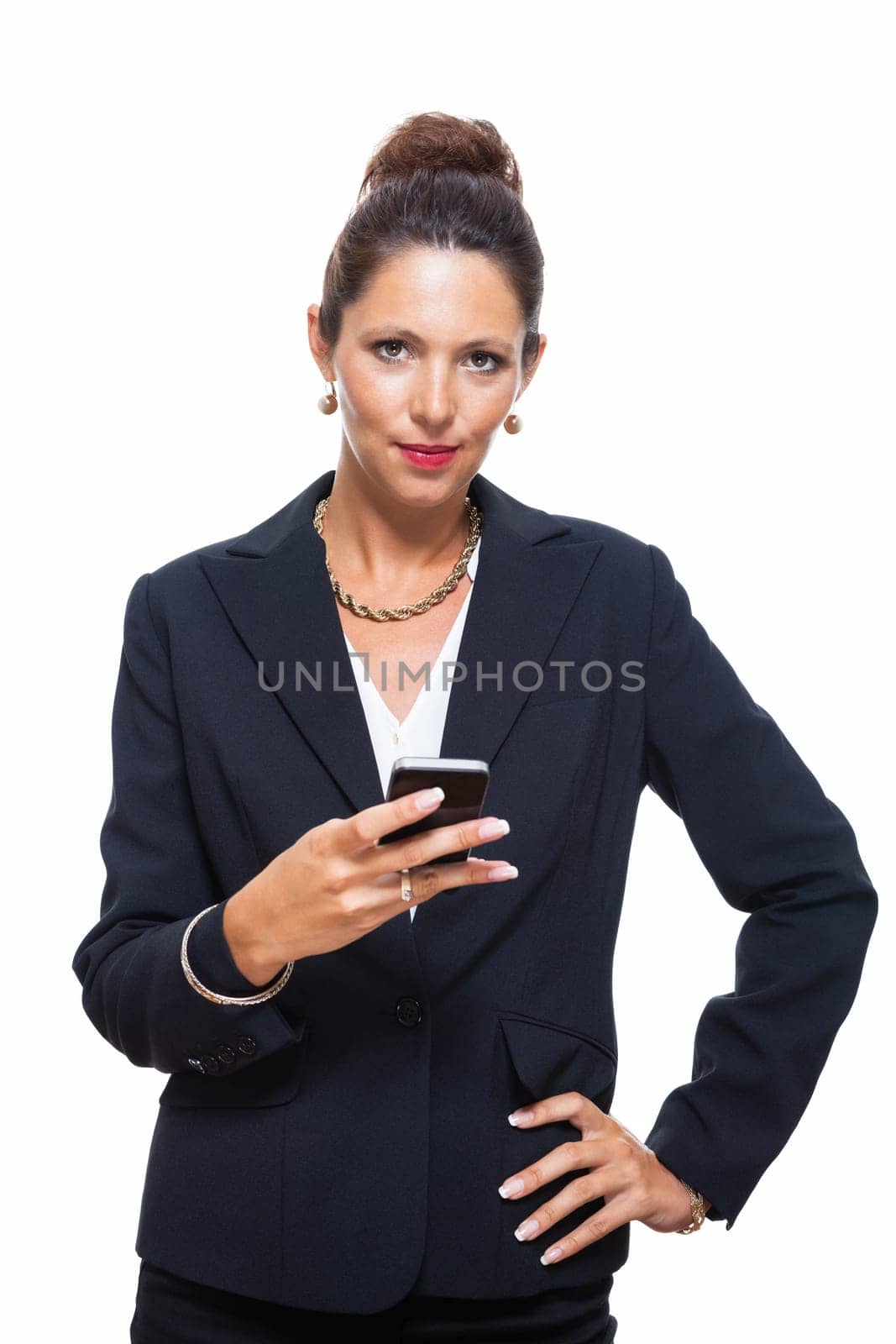 Young businesswoman in black costume with mobile phone smartphone while making phone calls