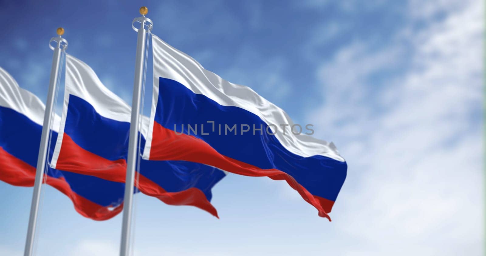 Three national flags of Russia waving in the wind on a clear day. White, blue and red horizontal stripes. Russian Federation flag. 3D illustration render. Fluttering textile.