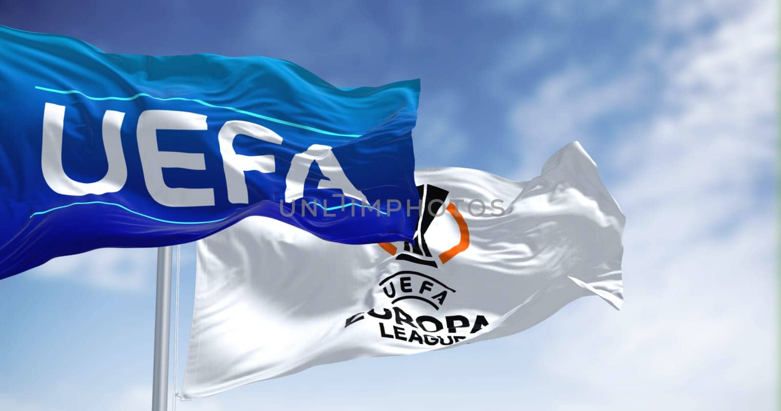 Budapest HUN, July 2022: UEFA and UEFA Europa League flags waving in the wind. Europa League is an annual football club competition for european clubs. Illustrative editorial 3d illustration render