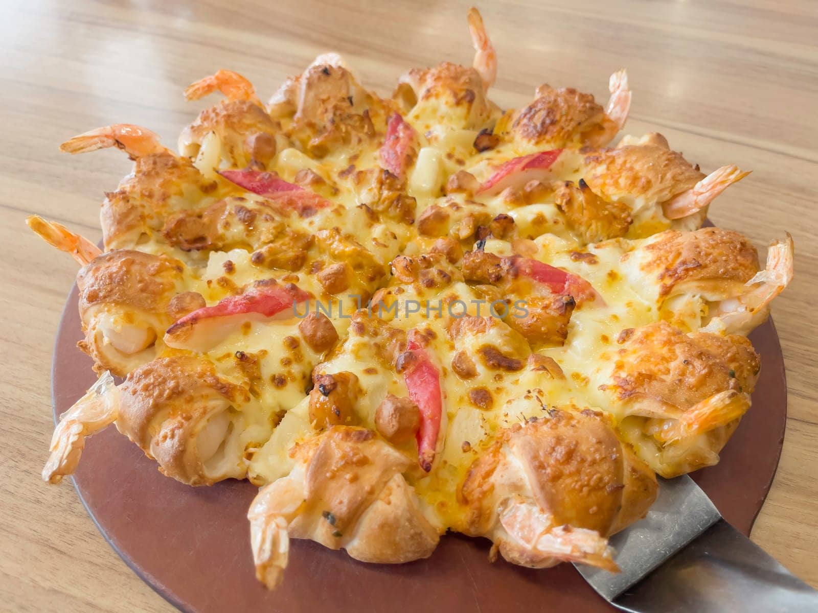 International franchise restaurant chain offers styles of pizza, stock photo