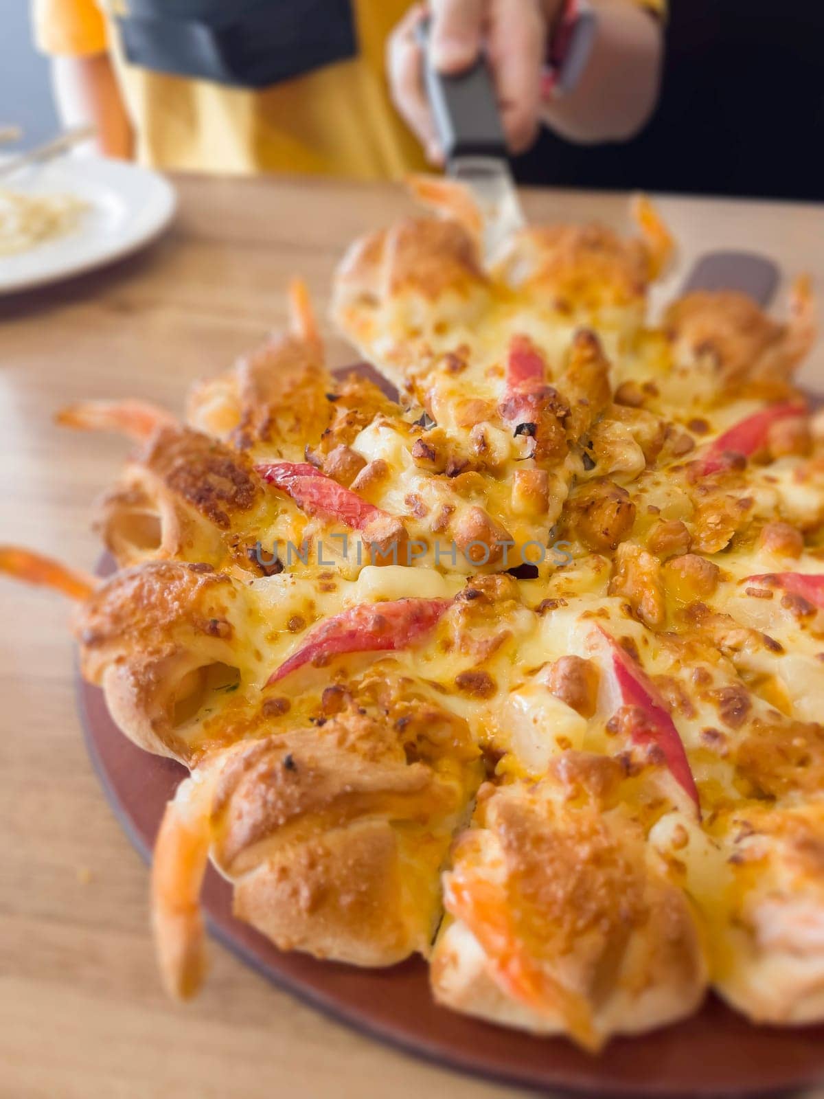 International franchise restaurant chain offers styles of pizza, stock photo