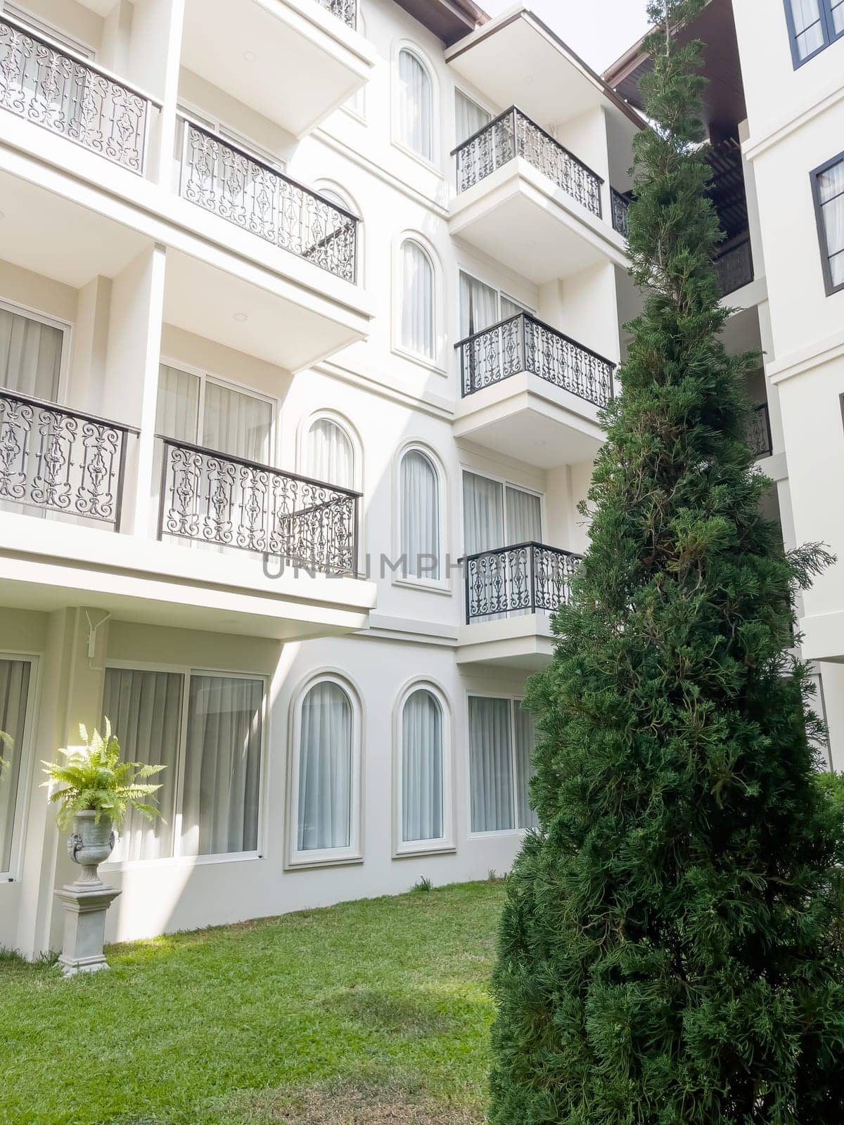 Summer sunlight building facade outdoors, stock photo