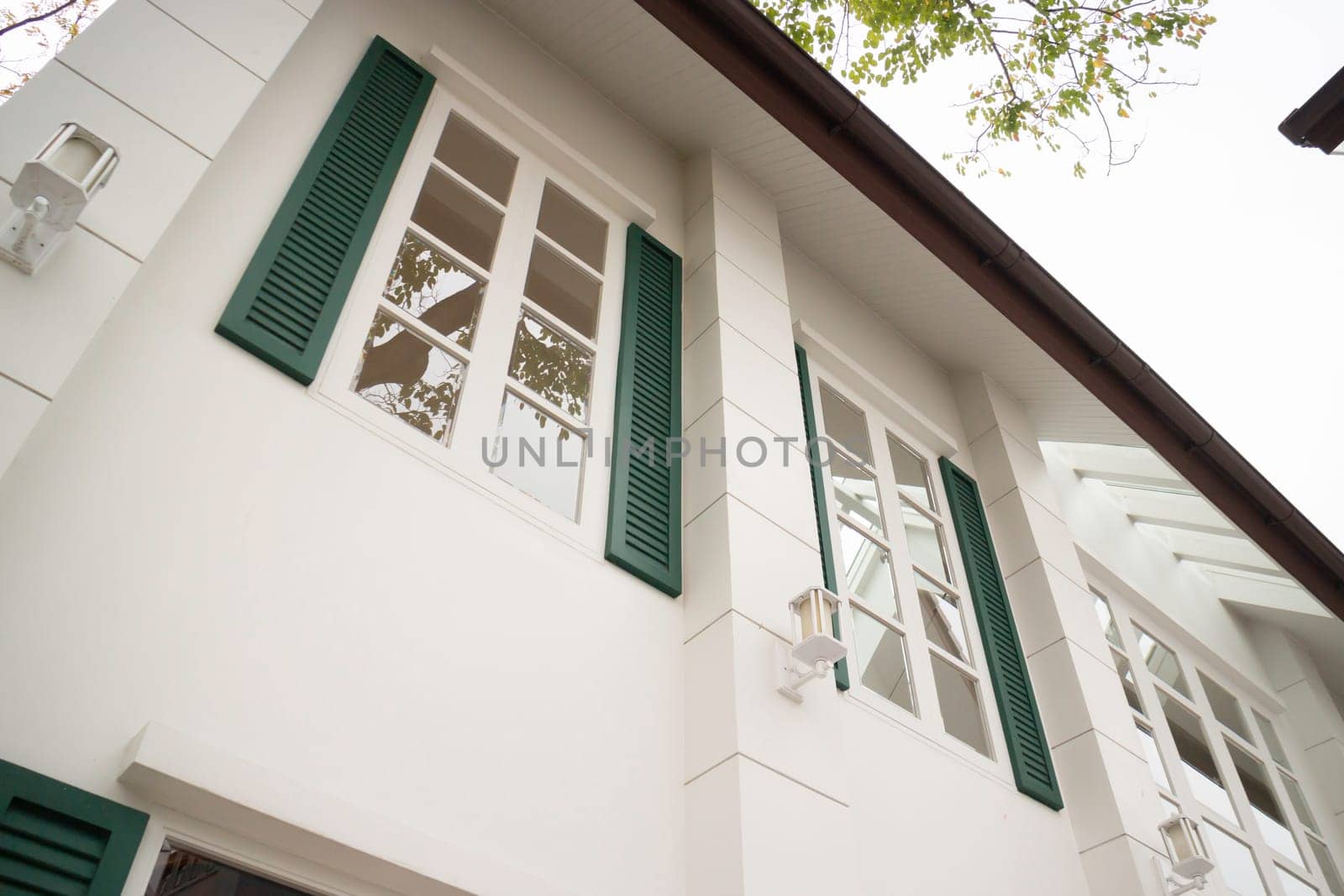 Summer sunlight building facade outdoors, stock photo