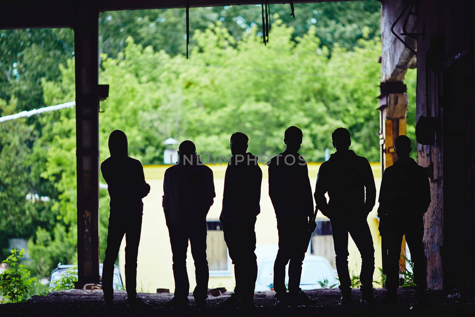 Outlines of gangster team outside