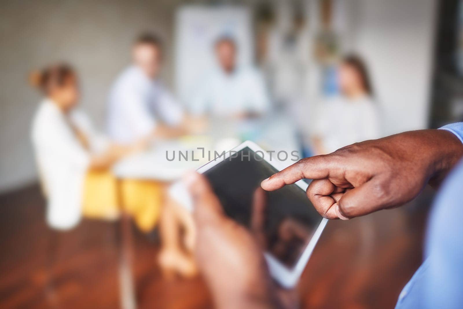 Male forefinger pointing at touchscreen