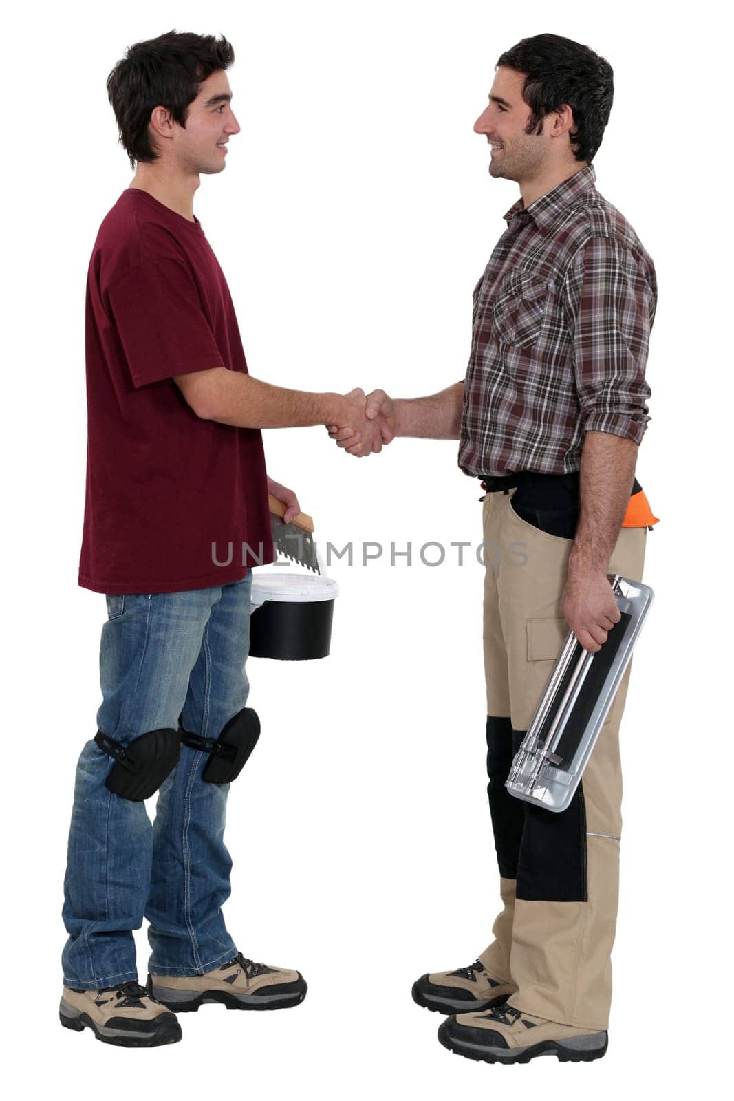Workers shaking hands