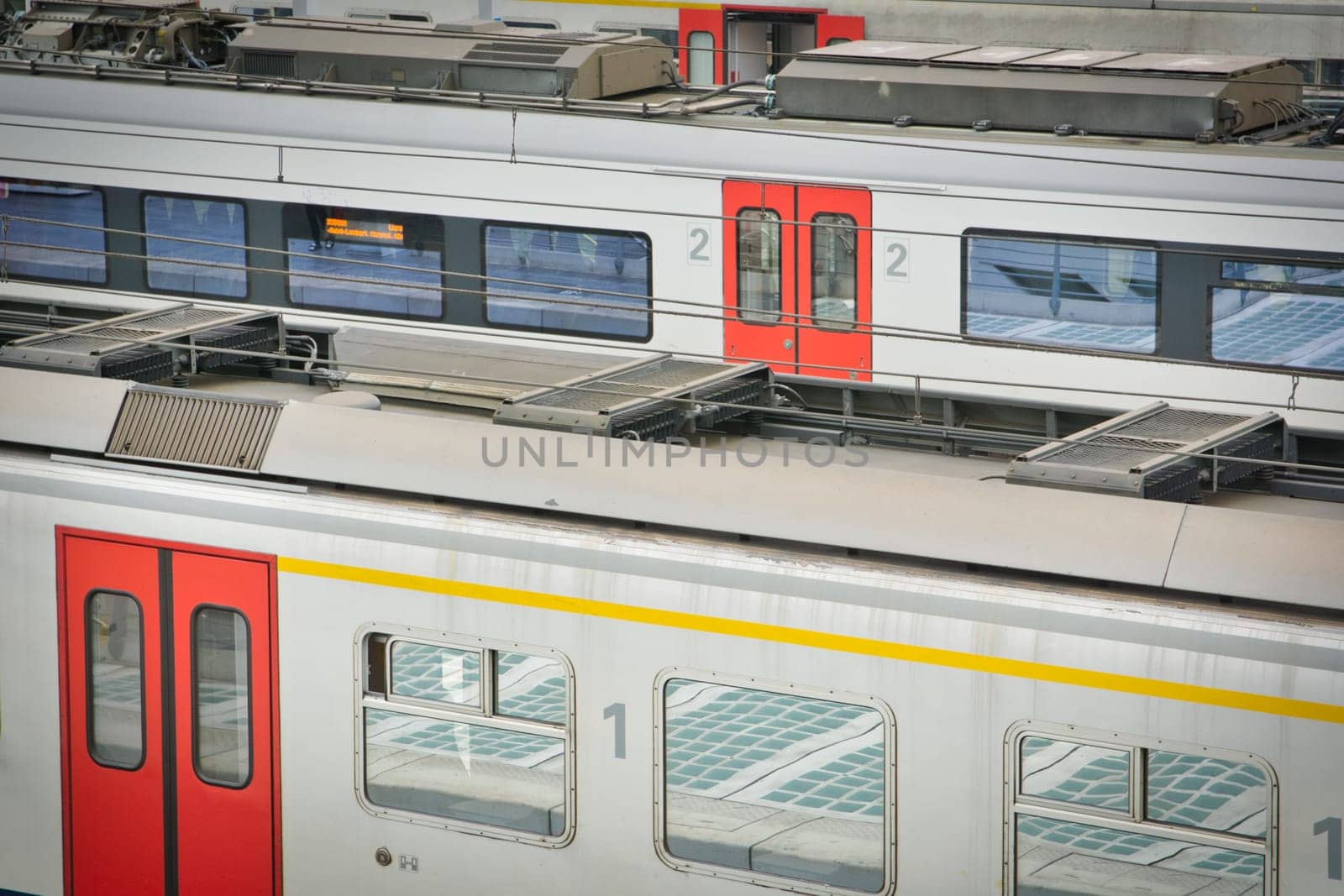 Liege, Belgium, June 2021: Belgian NMBS SNCB railroad trains in a train station. Close-up and detail.