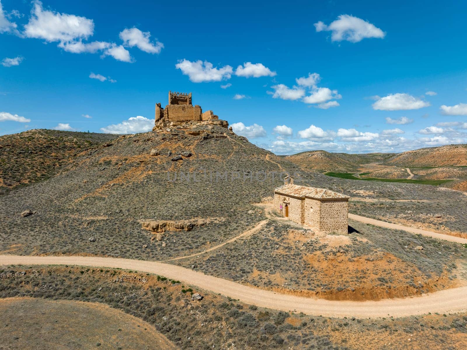 Aerial view of Pozuel de Ariza in the province of Zaragoza La Raya castle and Our Lady of the Tower hermitage