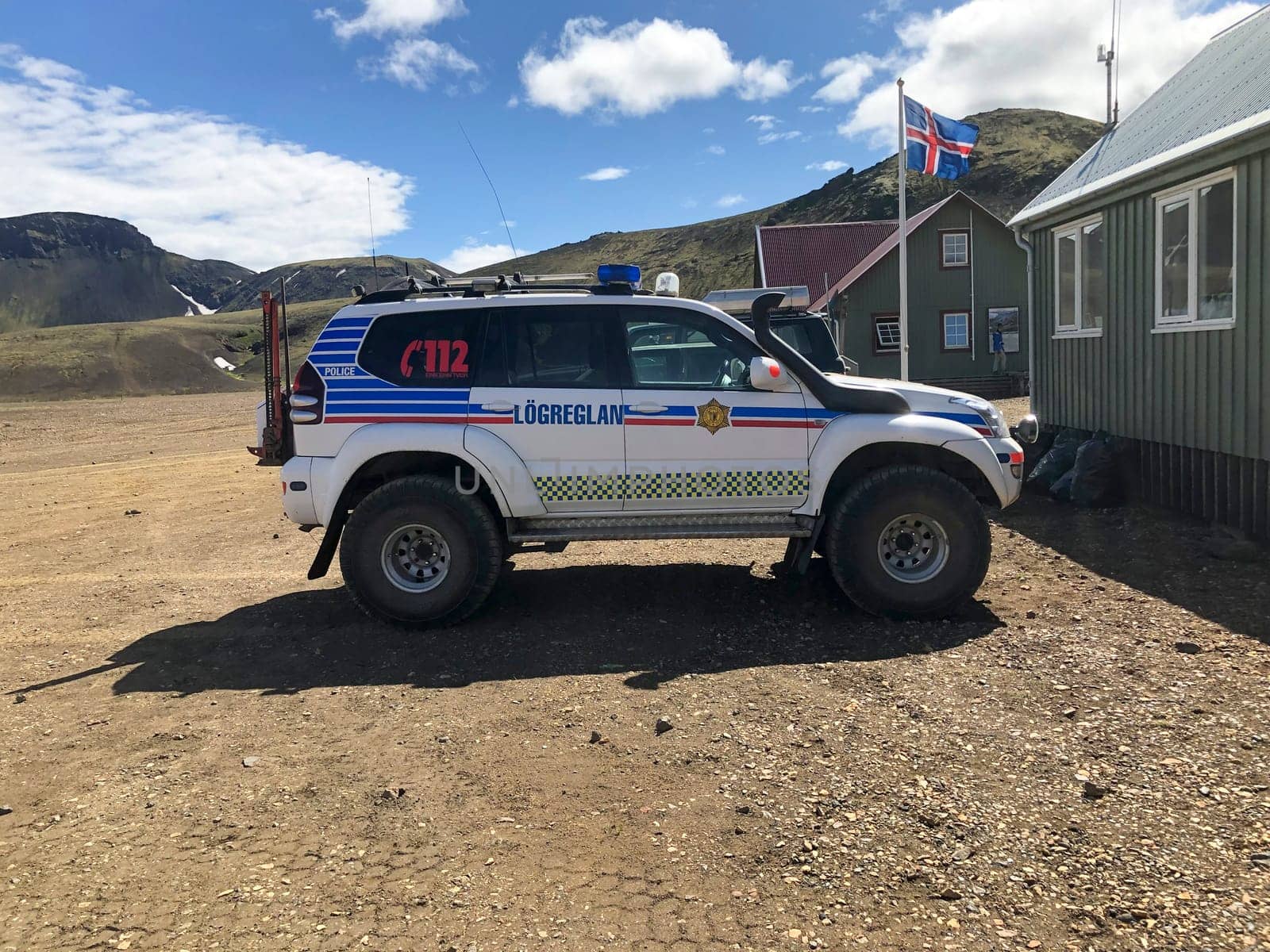 Alftavatn Hut, Iceland, July 2019: Icelandic police patrol super jeep in region logreglan, parked in front of hiker's hut